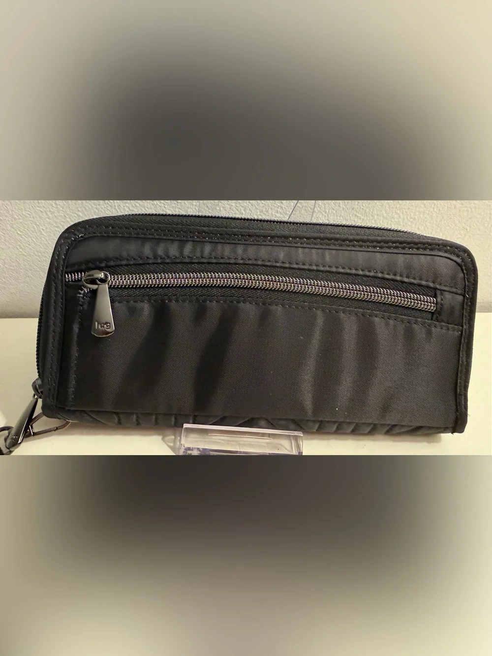 Lug Bags black Straddle Wristlet/Wallet with chevron quilted design on front